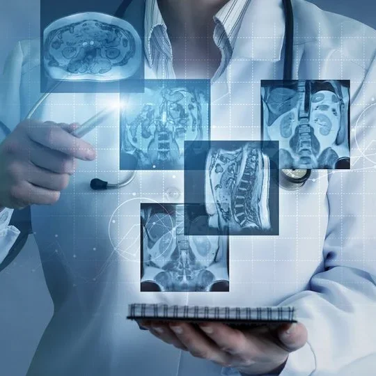 Doctor holding x-rays