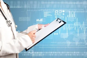 Doctor holding chart on clipboard