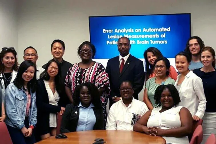 MII Rise faculty and staff in meeting room