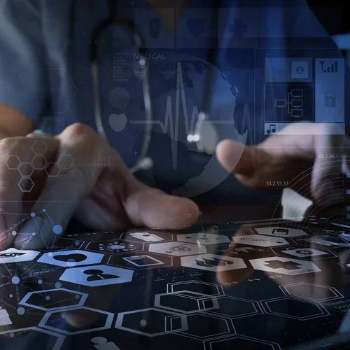 Doctor typing on touchscreen