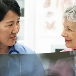 a patient consults with her physician